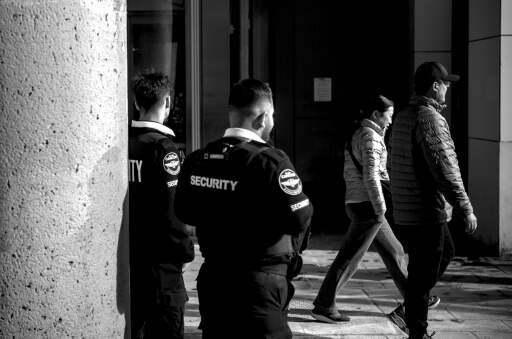 Intresting relation between the security and the people walking. 